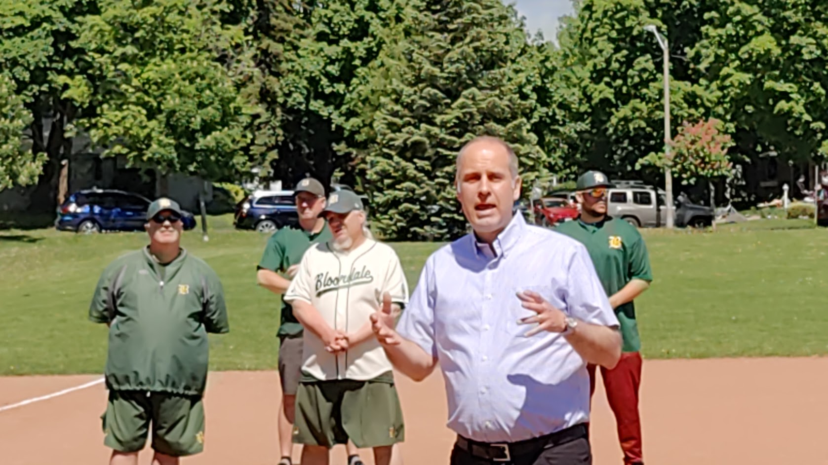 2 - Deputy Mayor Holiday speaking surrounded by Bloordale volunteers Deputy Mayor Holiday speaking